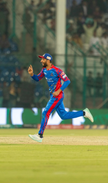 Shan masood runs to celebrate wicket
